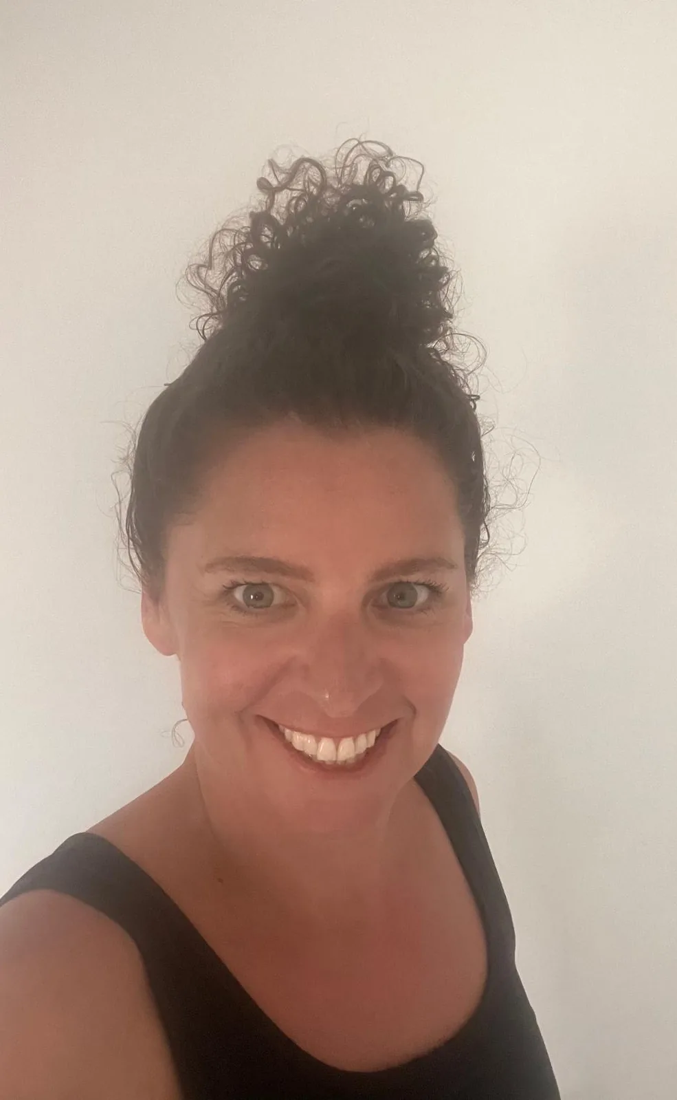 Holly Rai, founder of Beyond Typical Training, smiling at the camera
