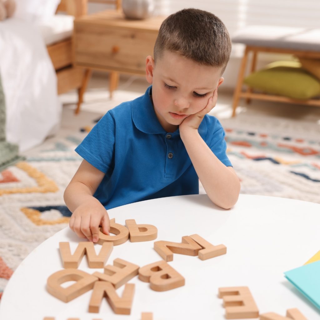 Child receiving literacy support